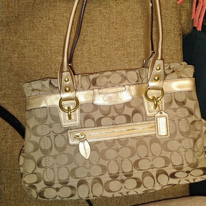 #103 coach Penelope signature